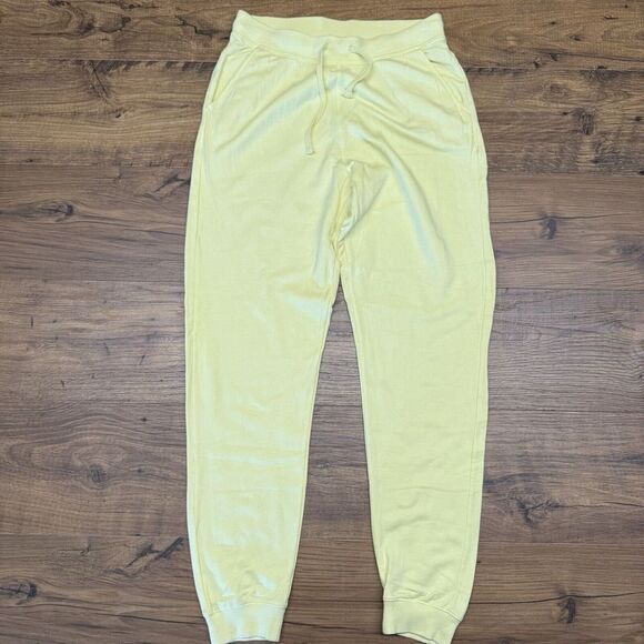 Nike Womens Small Yoga Luxe‎ 7/8 Fleece High Rise Joggers Yellow DN0936-010 - Picture 1 of 8